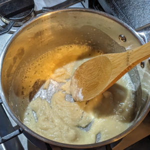 The roux for thickening the basic white sauce. With the appearance of very wet sand.