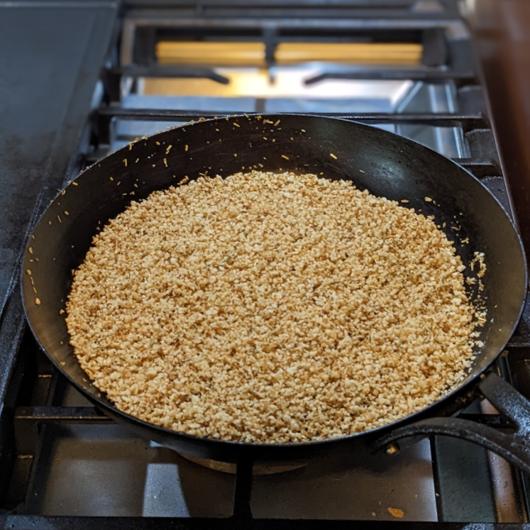 Perfectly browned Rosemary Herbed Breadcrumbs on the stovetop